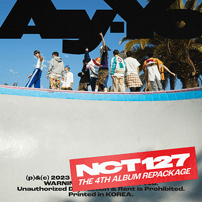 Album cover for NCT 127's "Ay-Yo", featuring the group standing above a skate ramp, facing away from the camera. The sky is clear blue and there is a palm tree on the top left corner.