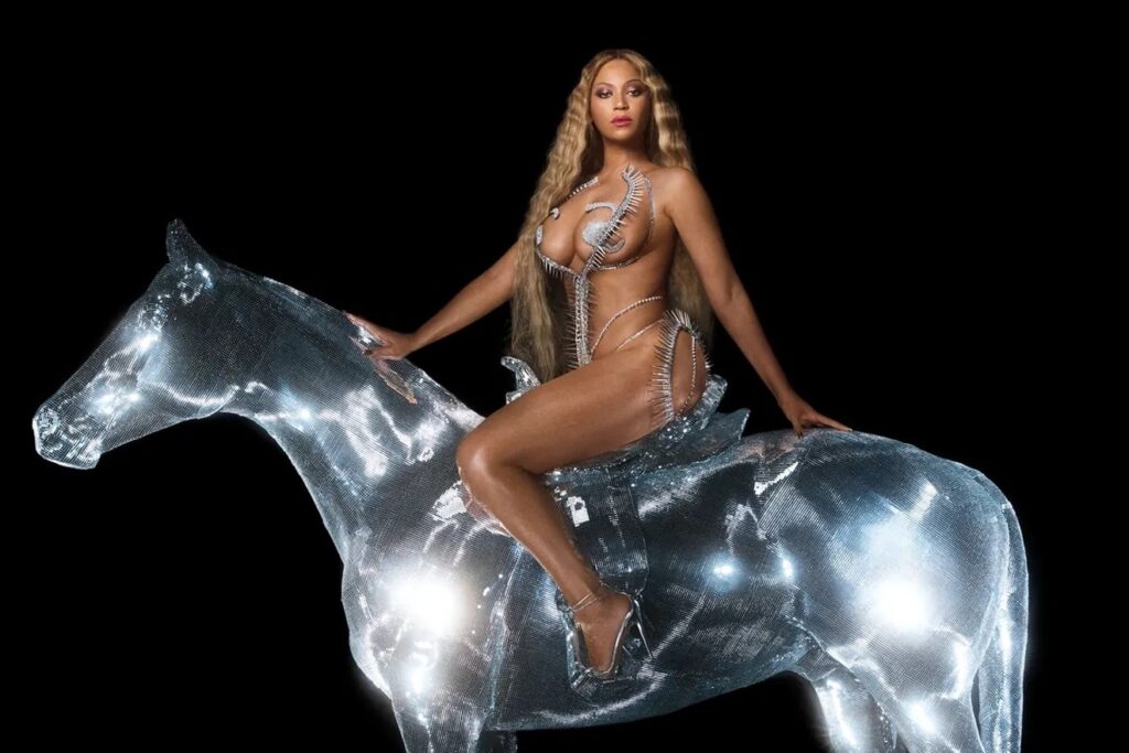 Cover image of Beyonce's "Renaissance" album, which features Beyonce herself atop of a horse made of disco ball material, facing the camera.