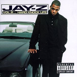 Album cover for Jay-Z's "Vol. 2... Hard Knock Life", which features Jay himself staring the camera down as he slightly leans against a black Bentley convertible to his left. He is wearing an all-black suit, and his other hand is in his pocket.