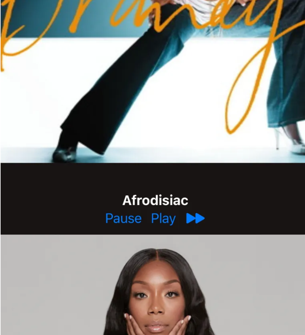 The album cover for Brandy's "Afrodisiac", below is a music player button. Below the music player is a picture of Brandy herself with her face cupped in her hands.